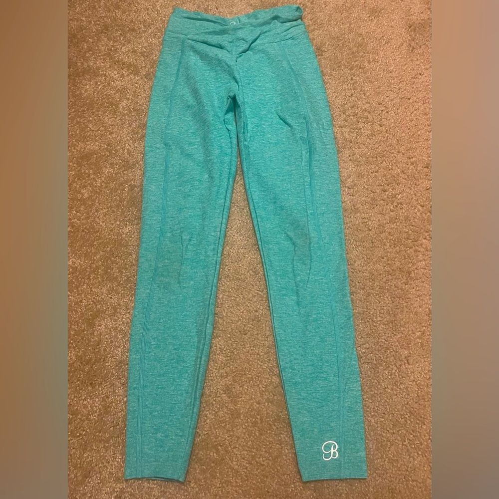 New without tags Bombshell Brazilian contour, teal leggings size small!